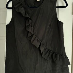J. Crew Elegant Black Ruffle Sleeveless Top
Taffeta-like feel
